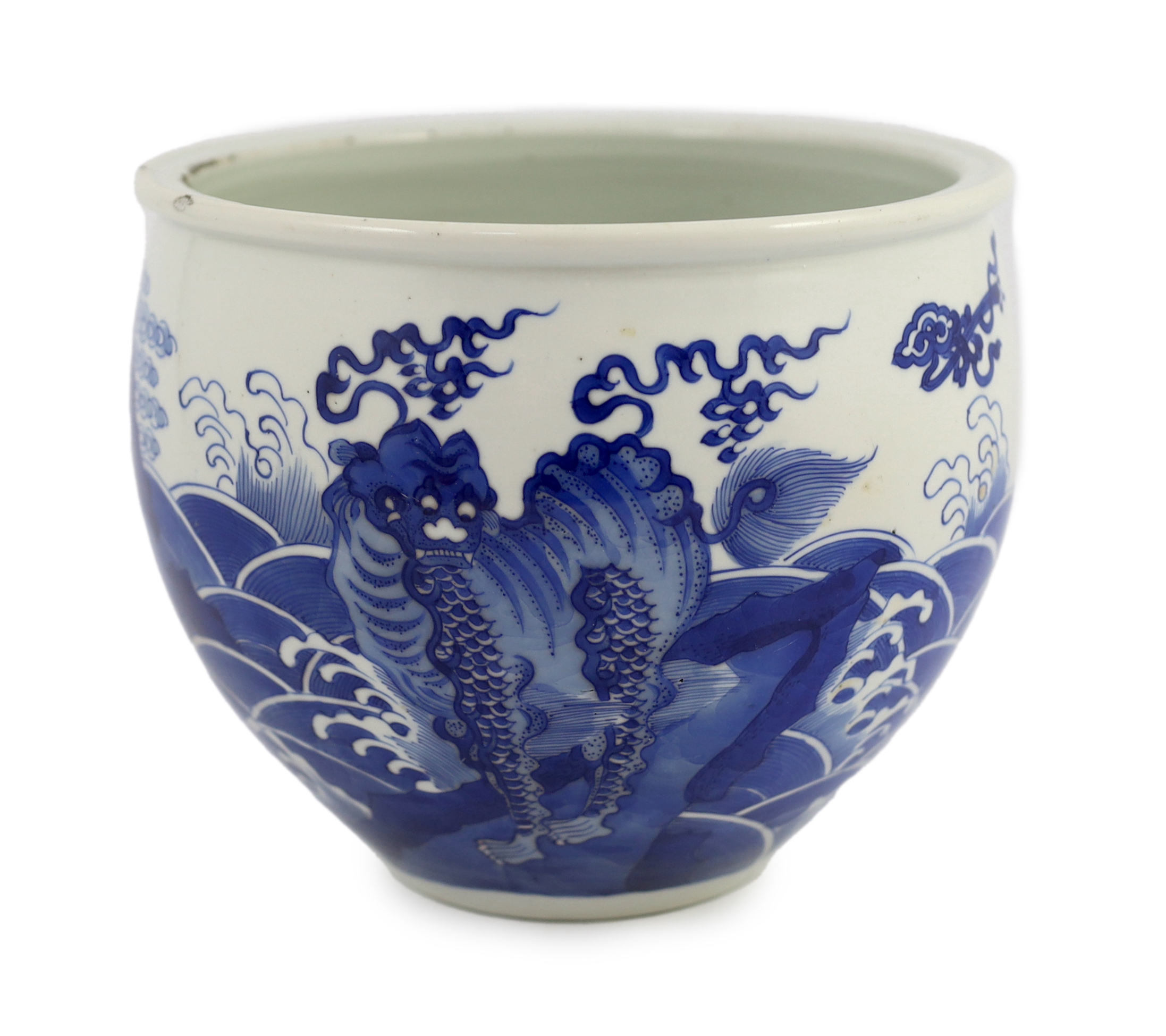 A Chinese blue and white ‘mythical beasts’ jardiniere, Kangxi period, chip and glaze losses to rim